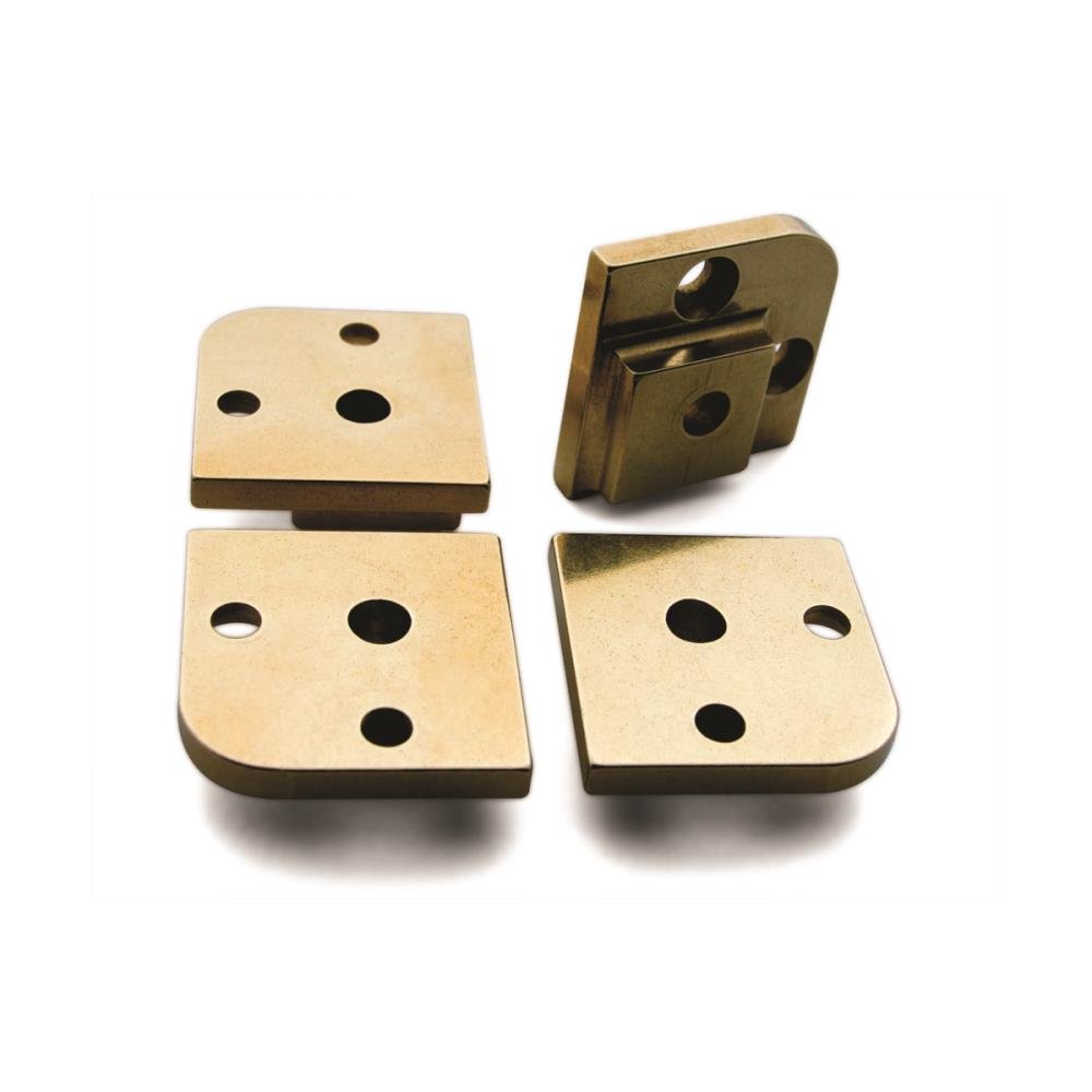 HD-702 Box Feet - A product photo of brass hardware on a white background